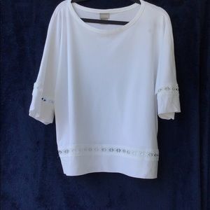 Chico’s white pullover top. With unique detail on sleeves & at waist. Size 2